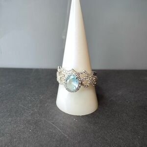 Elegant Rhodium Plating and Lab Created Light Aquamarine Gemstone Ring